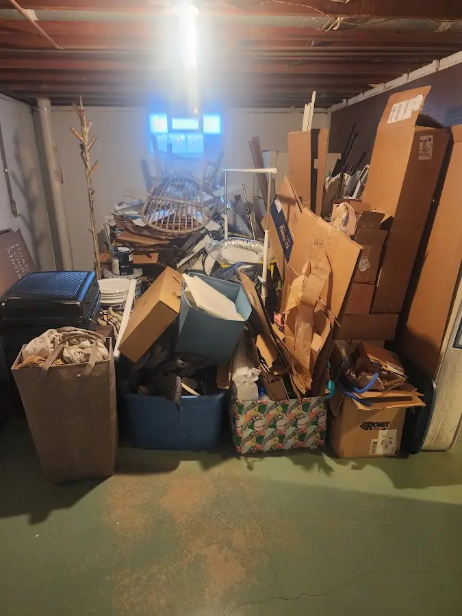 Roll-off dumpster container at job site for Construction Dumpster Rental in Abington